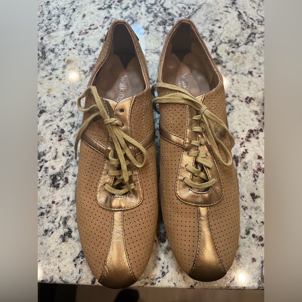 Brown and gold walking shoes